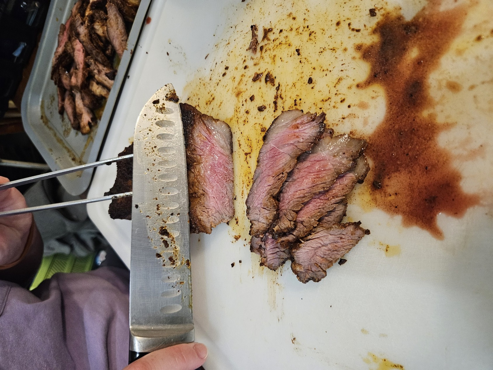 A picture of flank steaks after resting and slicing