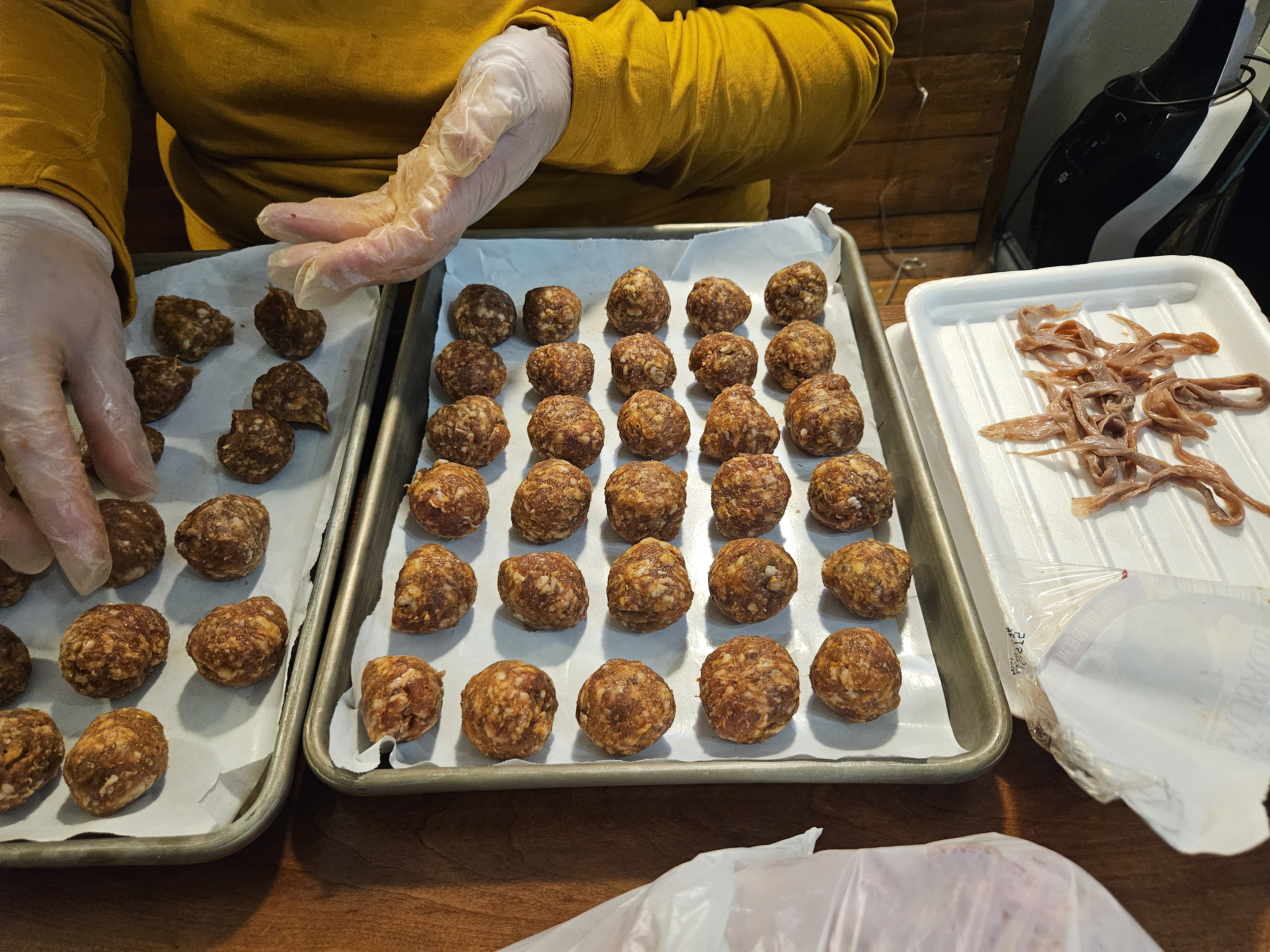 Sausage rolled into meatballs